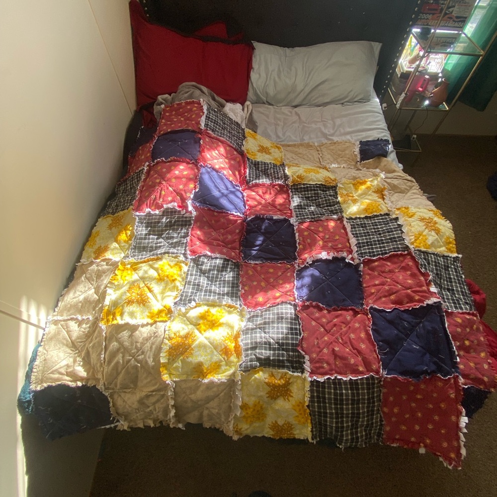 Patchwork Quilt with Red, Blue, and Yellow Squares